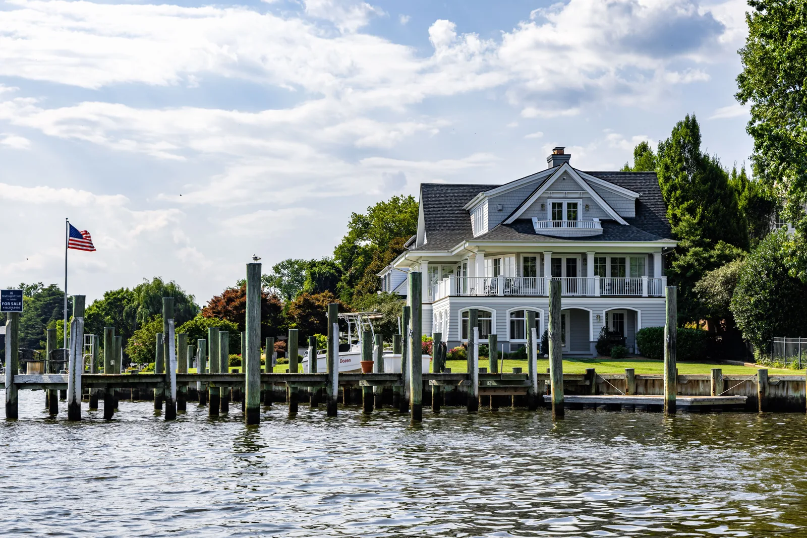 Annapolis waterfront home with a private dock on a sunny summer day